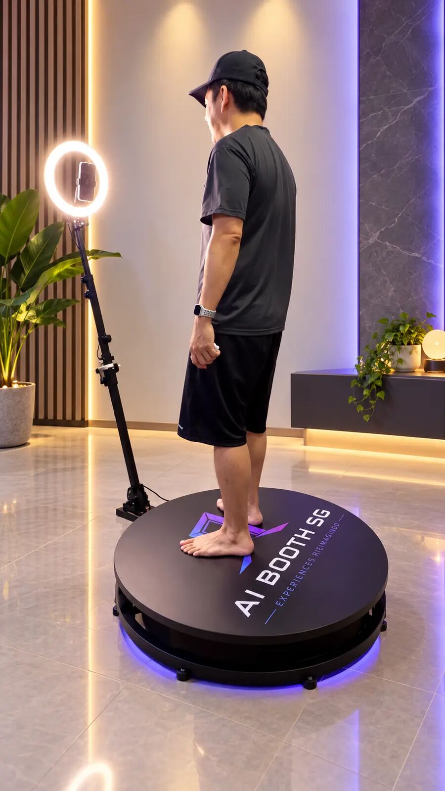 AI Booth SG 360 video booth platform with LED underglow and rotating camera arm